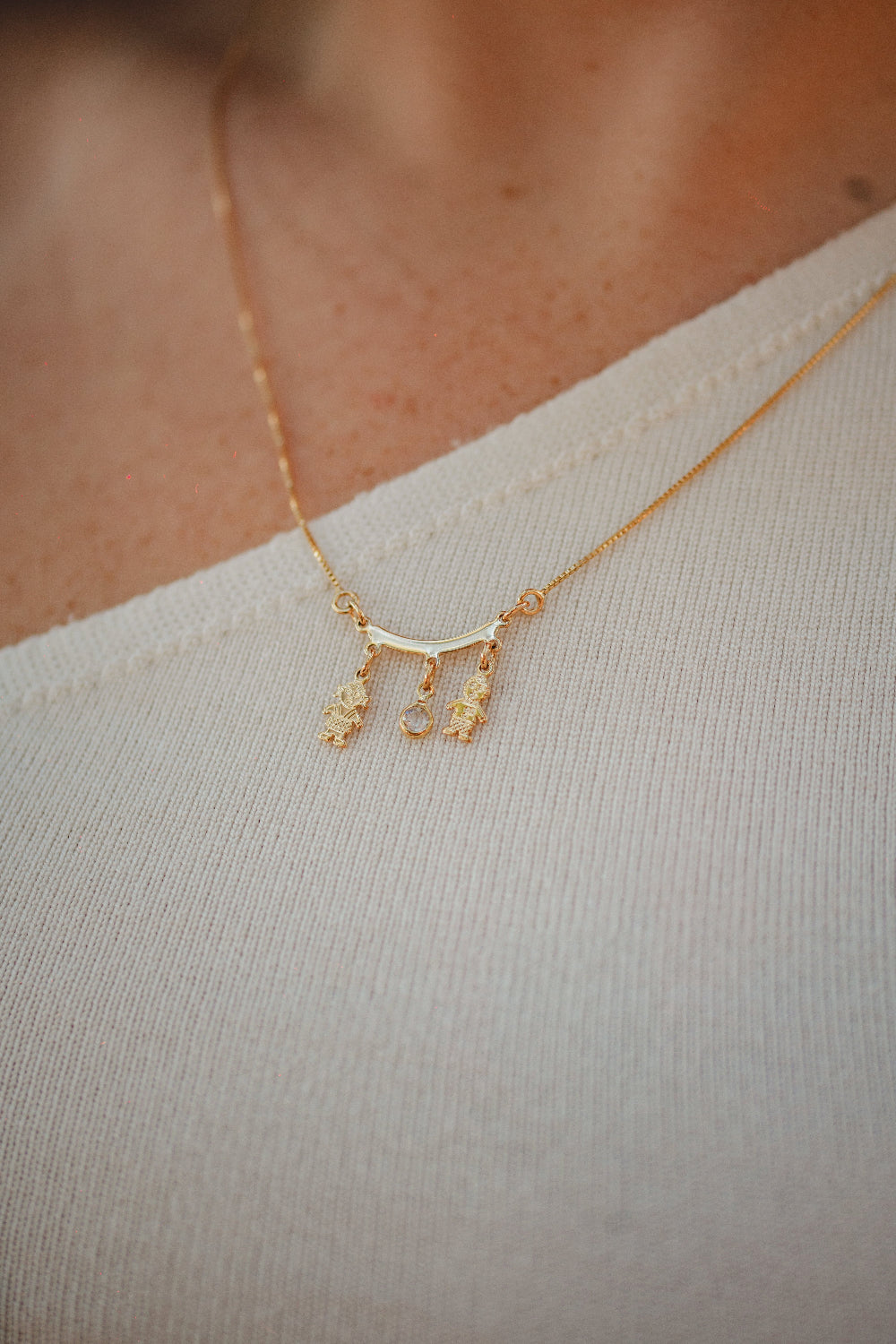 COLAR CASAL DE FILHOS COM PEDRA FOLHEADO A OURO 18K