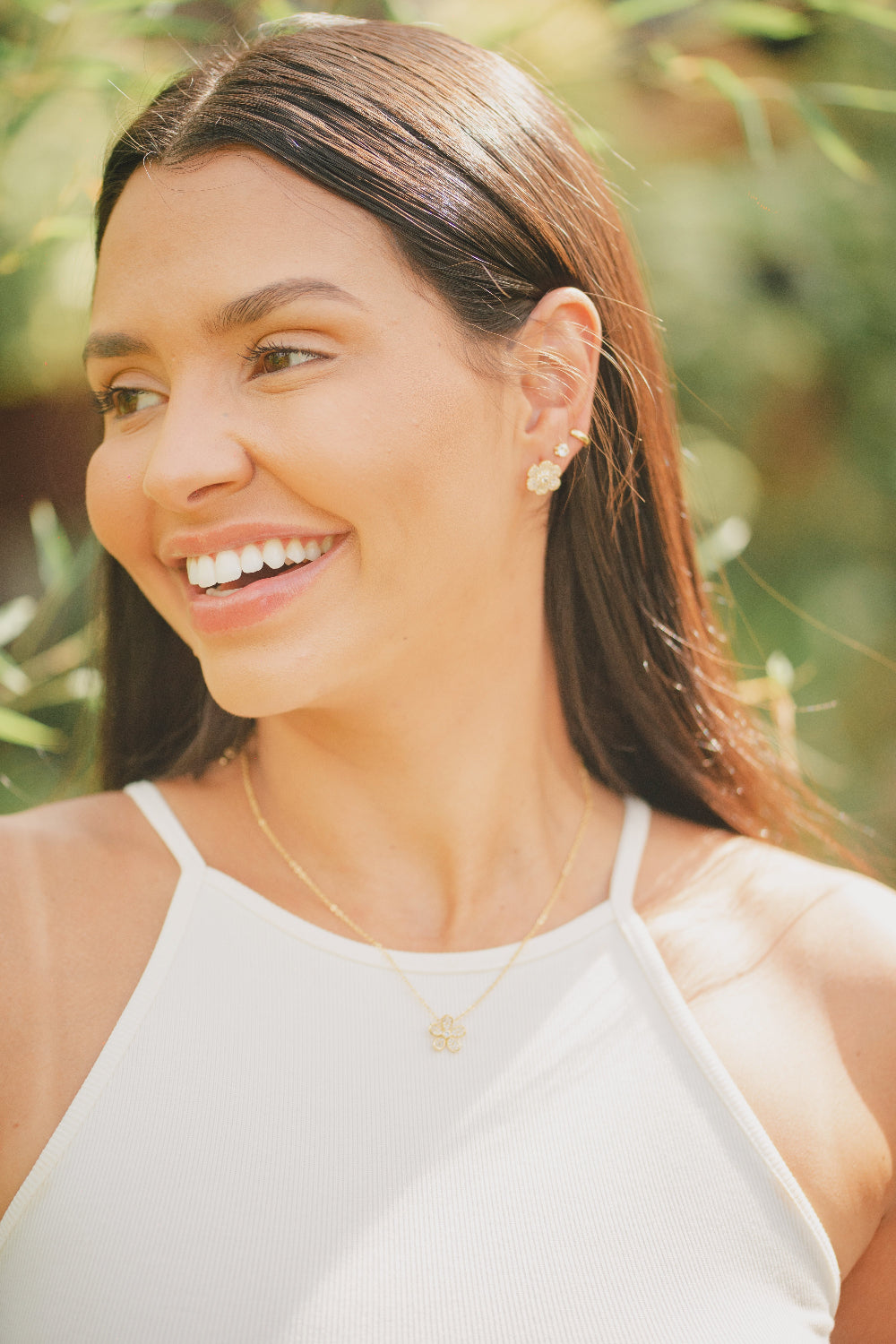 BRINCO COM PONTO DE LUZ FOLHEADO A OURO 18K