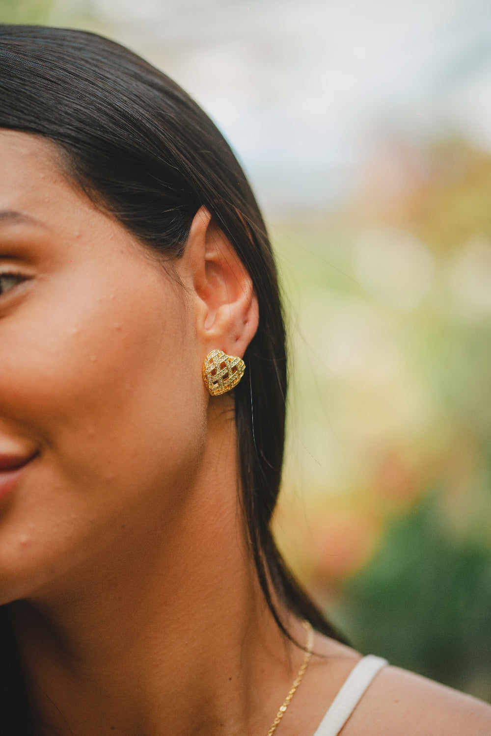 BRINCO CORAÇÃO XADREZ COM ZIRCÔNIAS FOLHEADO A OURO 18K