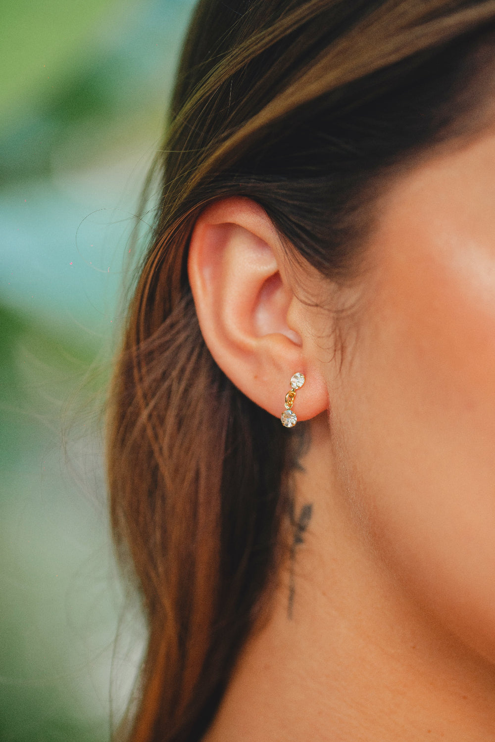 BRINCO REDONDO COM PINGENTE DE ZIRCÔNIA FOLHEADO A OURO 18K