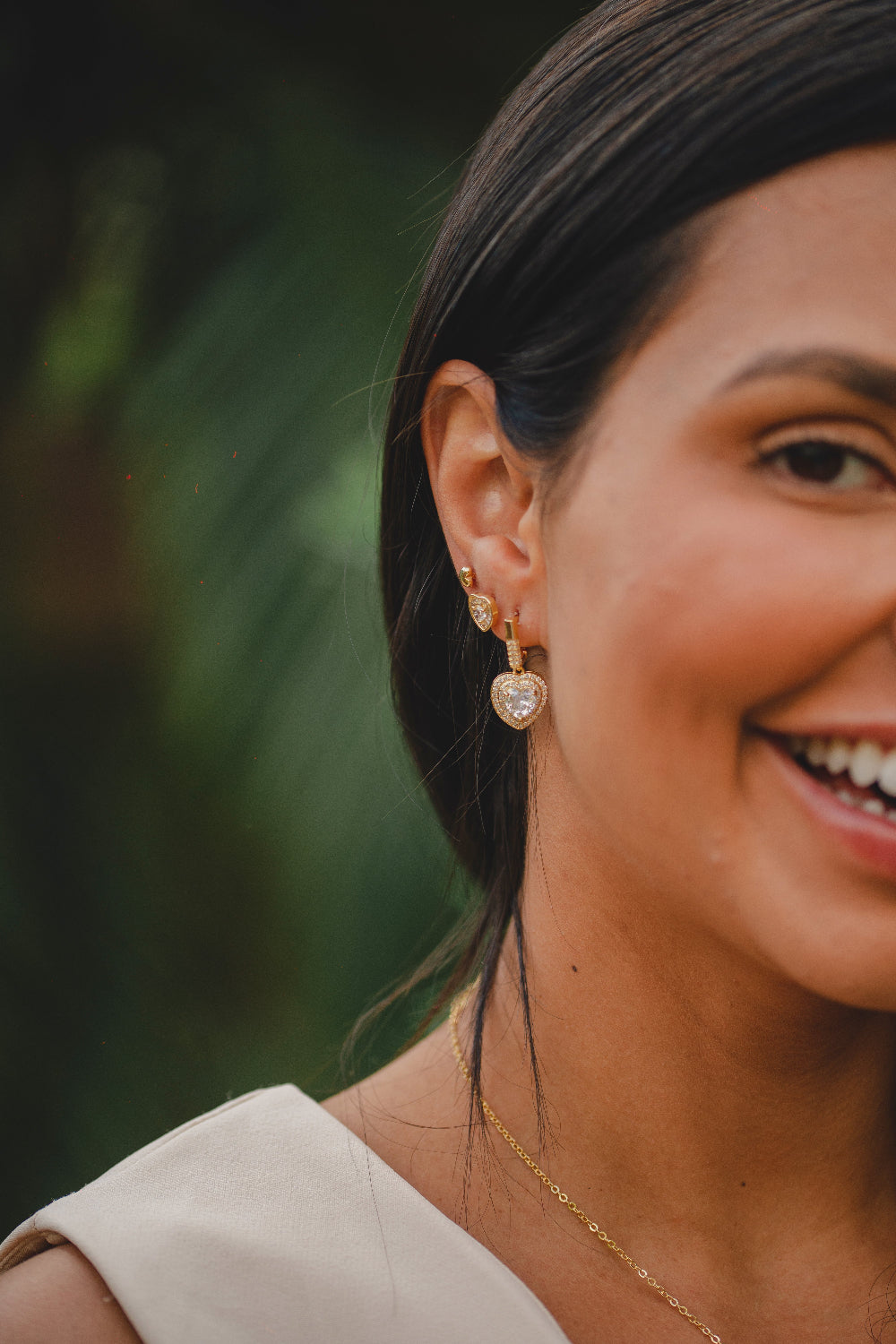 BRINCO MINI CORAÇÃO LISO FOLHEADO A OURO 18K