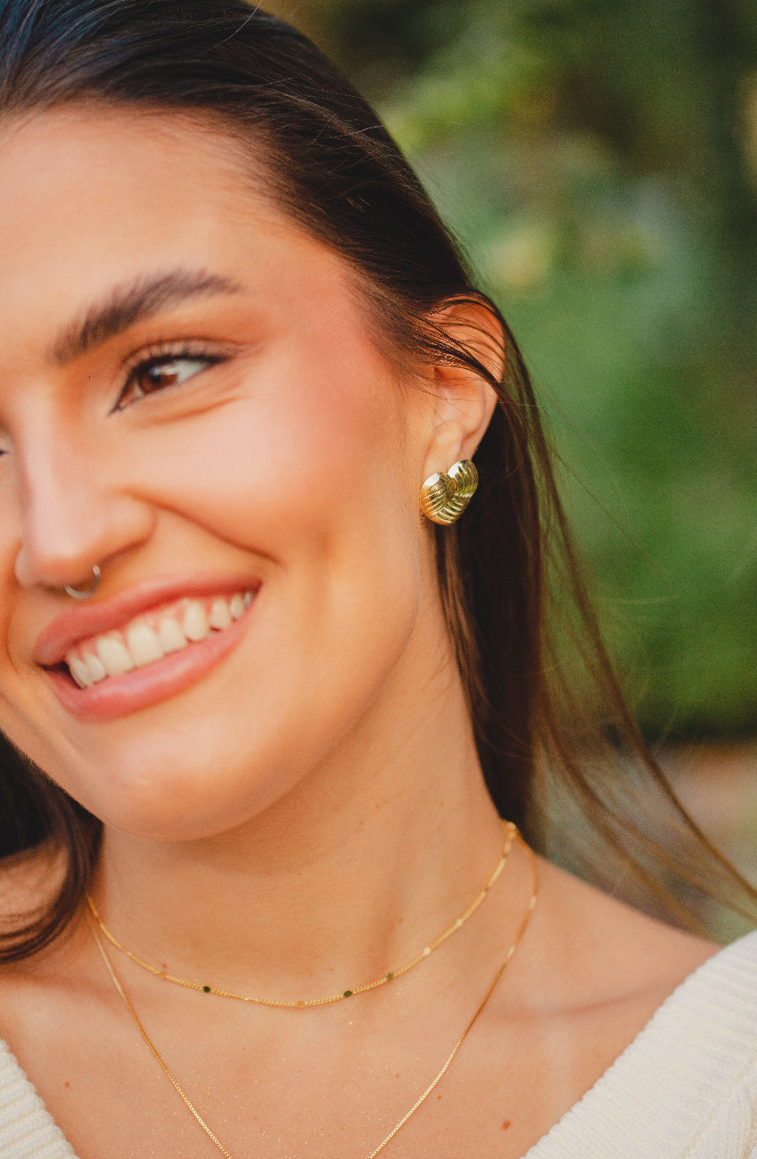 BRINCO CORAÇÃO TEXTURIZADO FOLHEADO A OURO 18K