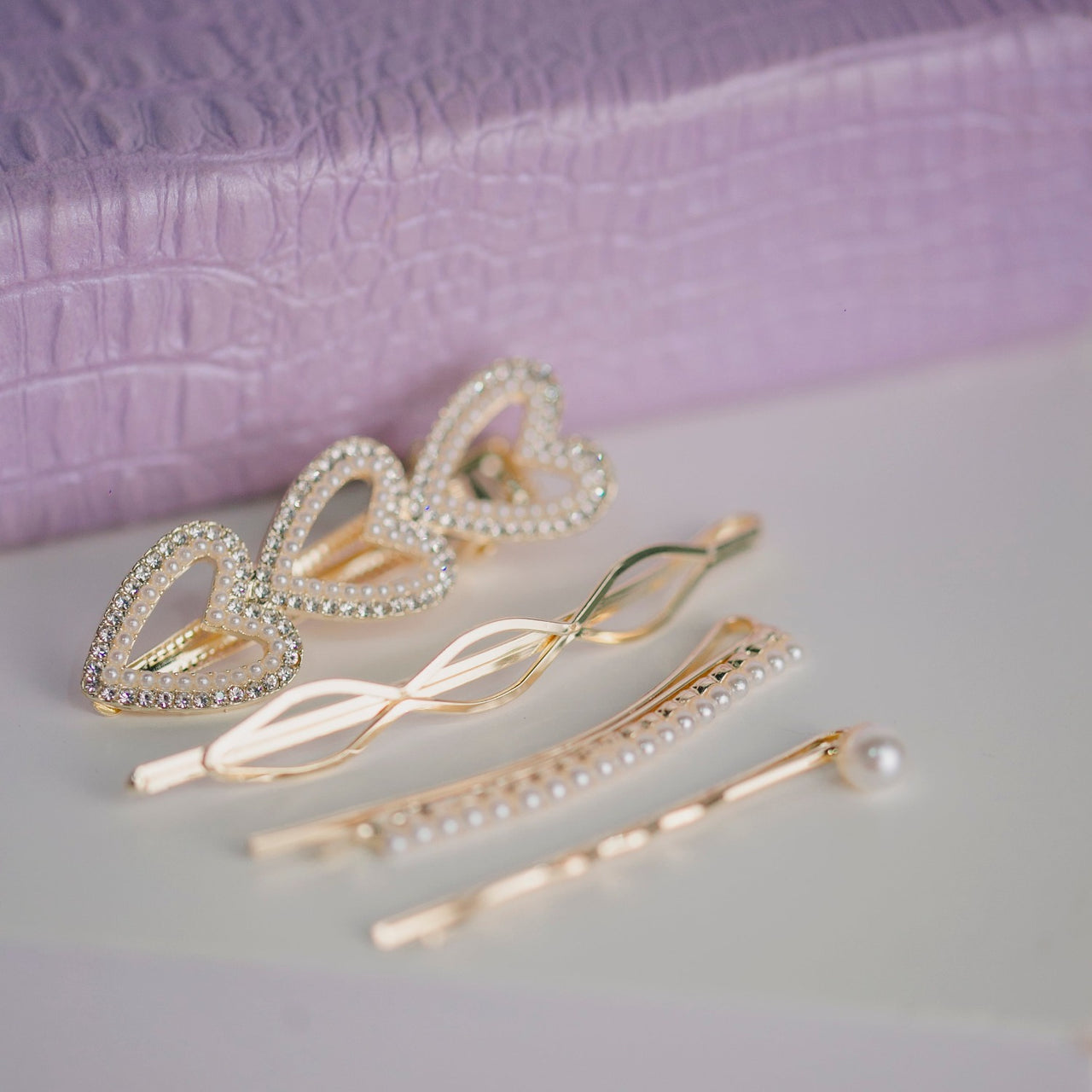 PRESILHAS BICO DE PATO PEROLADA OI FOFA