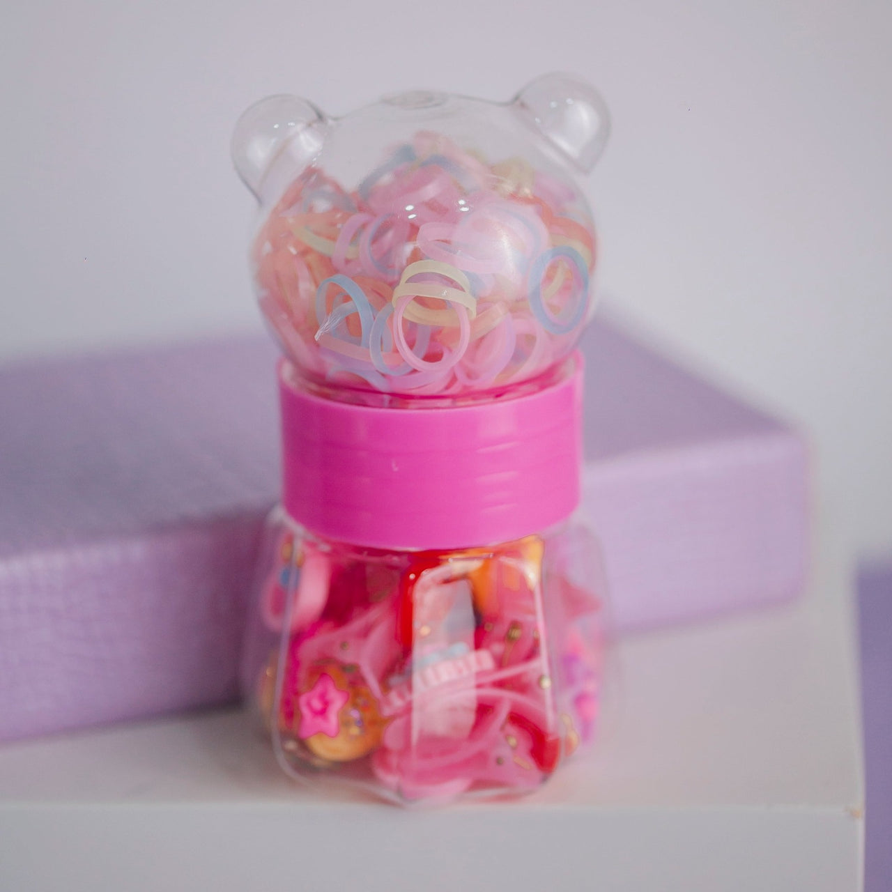 POTE DE URSO COM ELÁSTICOS E XUXINHAS OI FOFA
