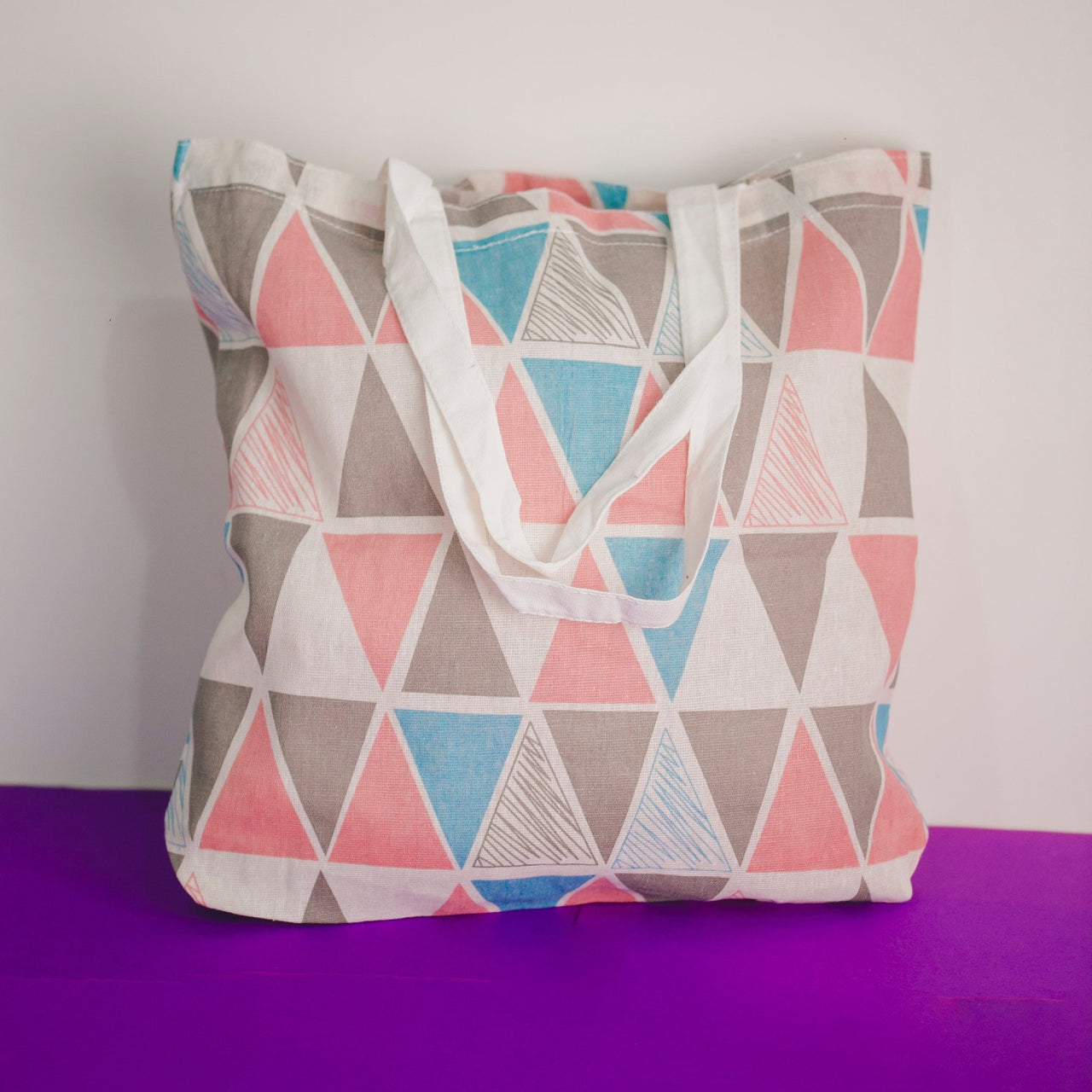 BOLSA ESTAMPA TRIANGULAR OI FOFA