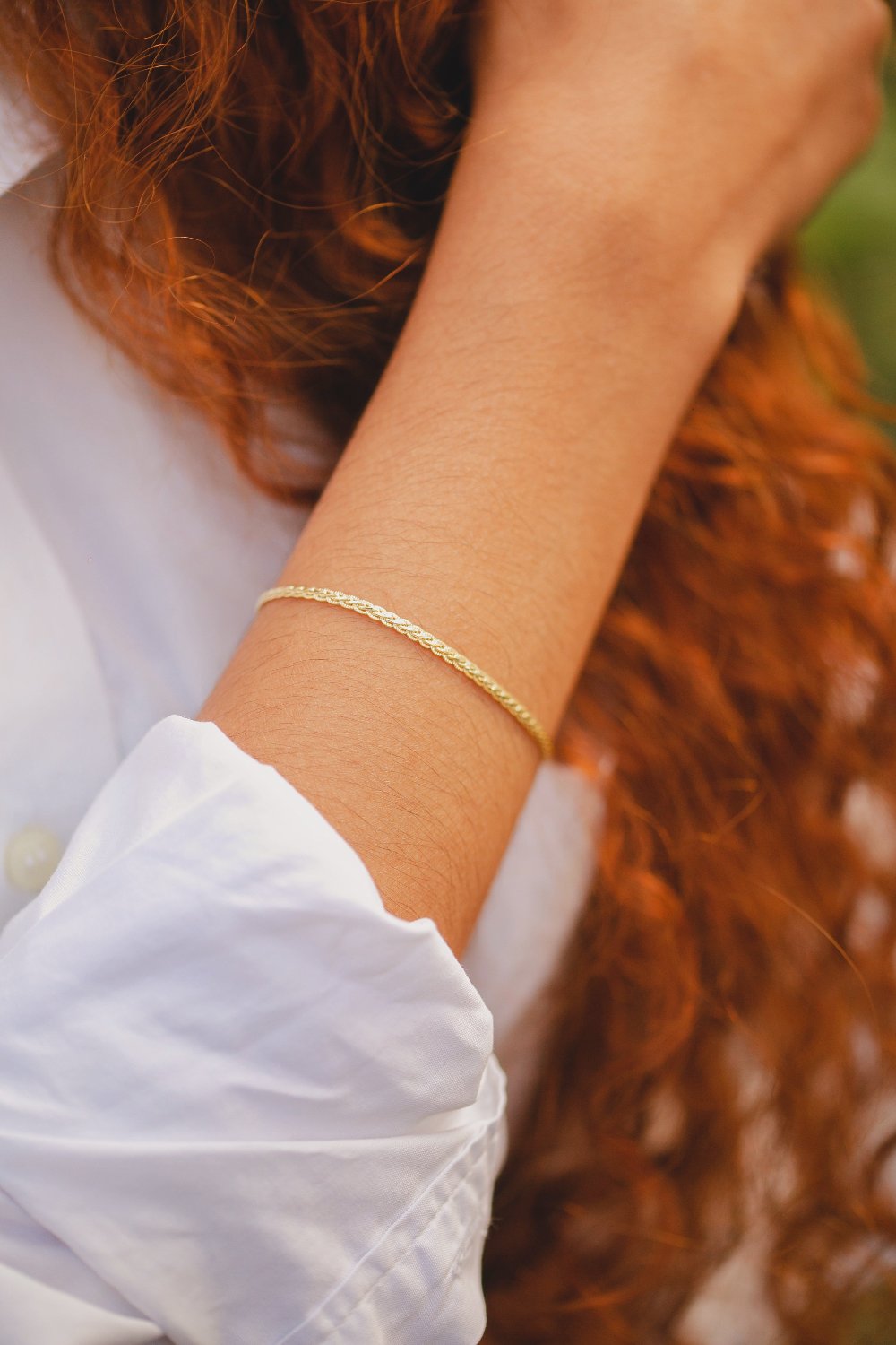PULSEIRA TRANÇADA FOLHEADA A OURO 18K