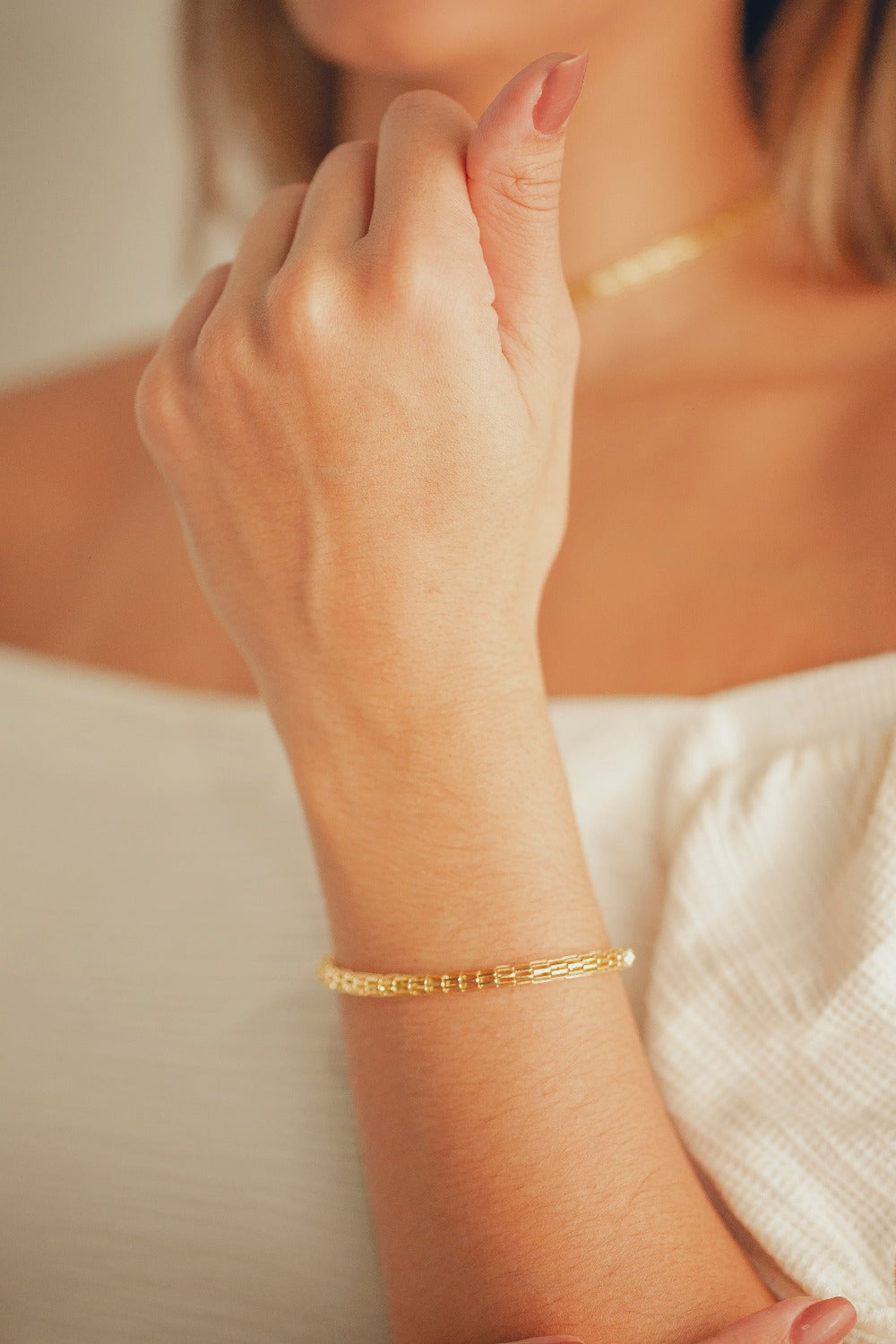 PULSEIRA MALHA OCA FOLHEADA A OURO