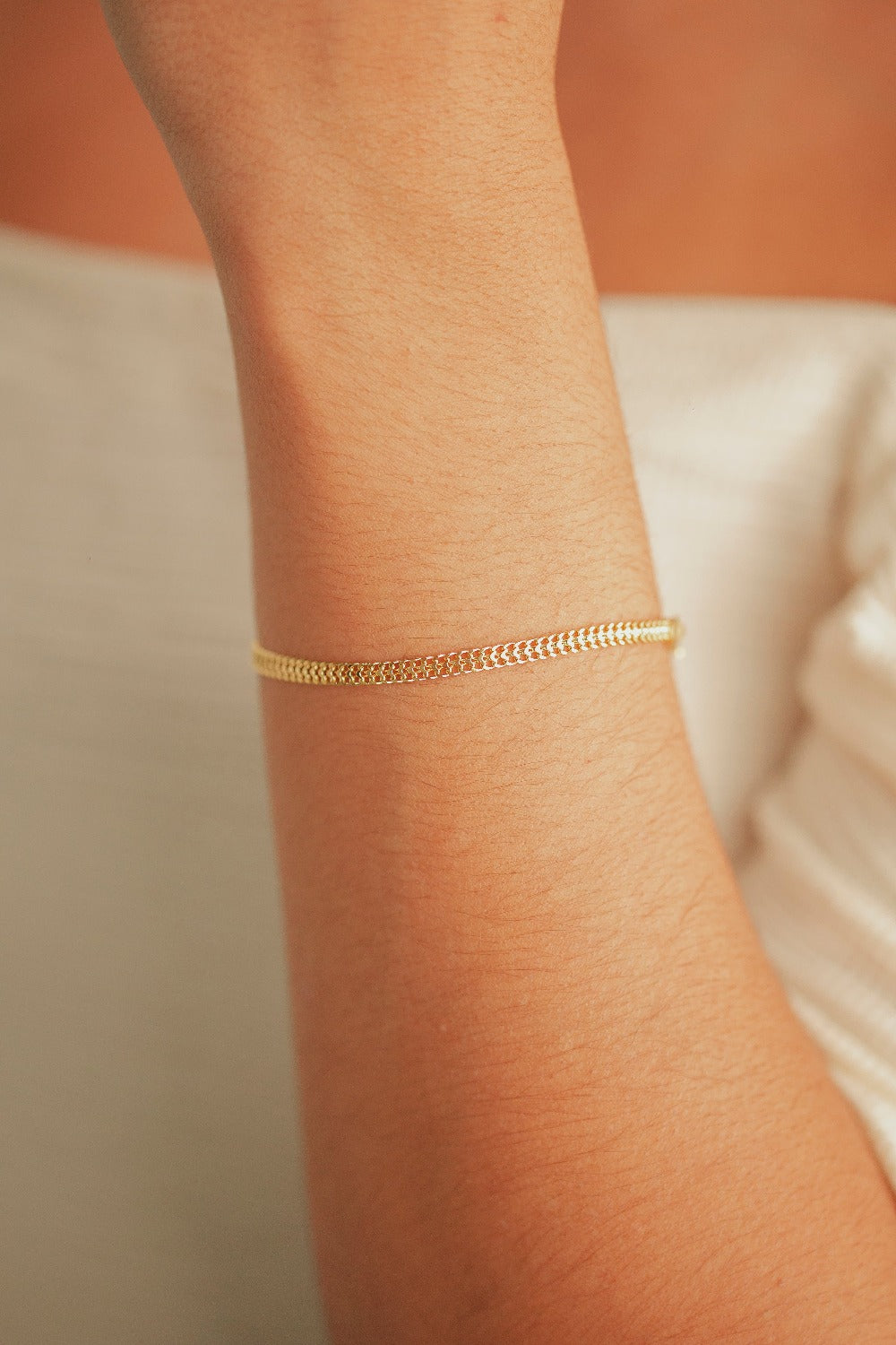 PULSEIRA MALHA TRANÇADA FOLHEADA A OURO