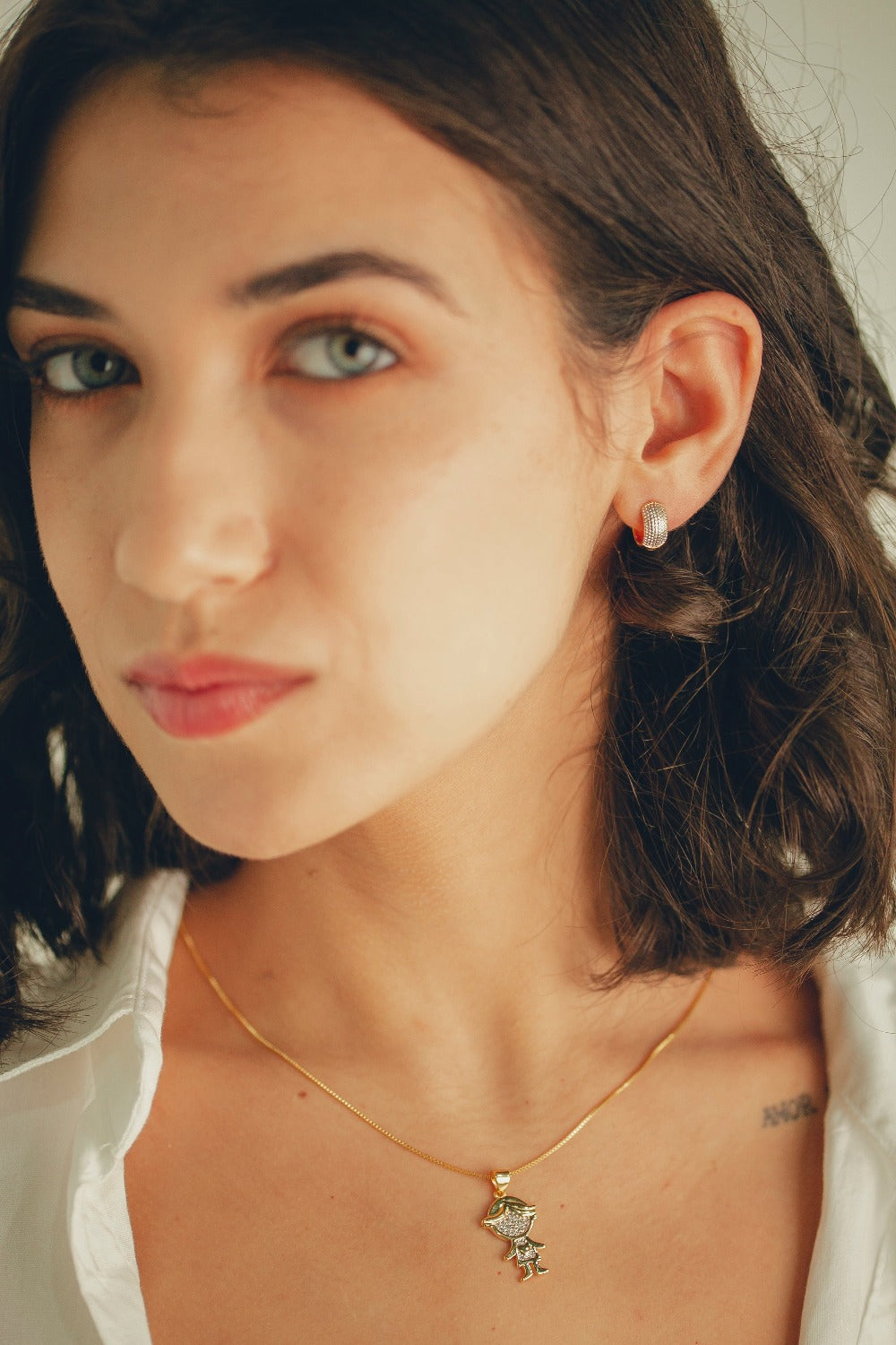 BRINCO DE ARGOLA MINI LARGA FOLHEADO A OURO 18K