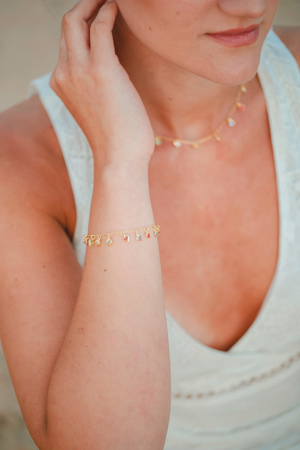 PULSEIRA COM MINI CORAÇÕES EM ZIRCÔNIA FOLHEADA A OURO 18K