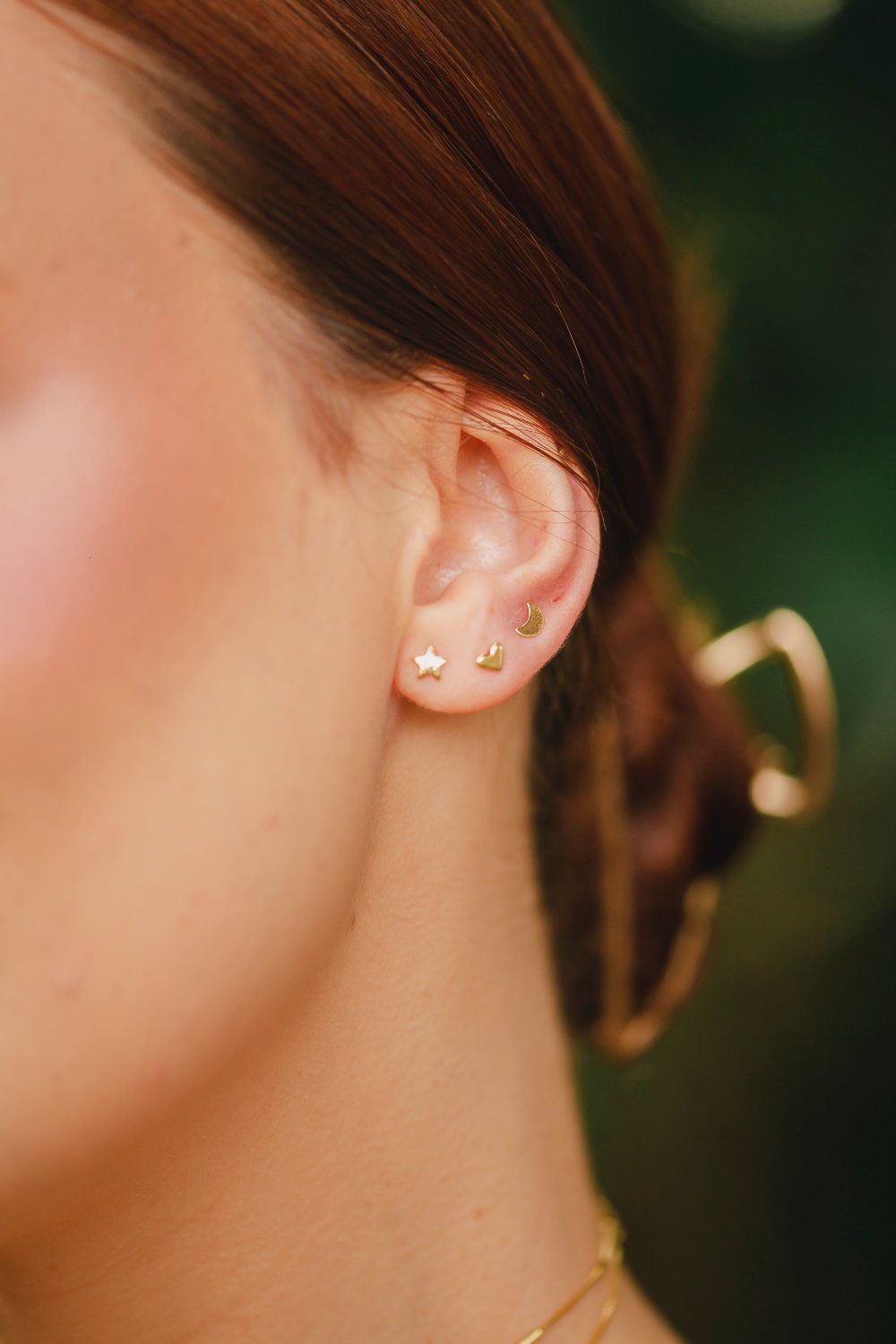 BRINCO MINI TRIO CORAÇÃO LUA E ESTRELA FOLHEADO A OURO 18K