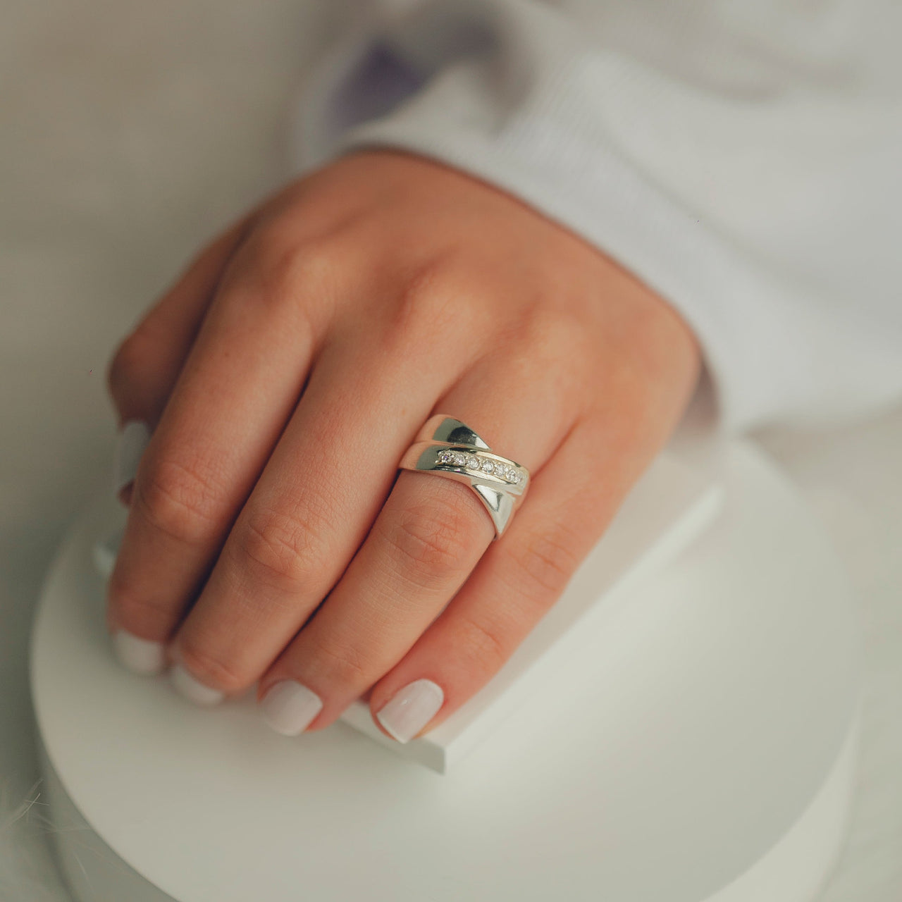 ANEL DE PRATA EM XIS