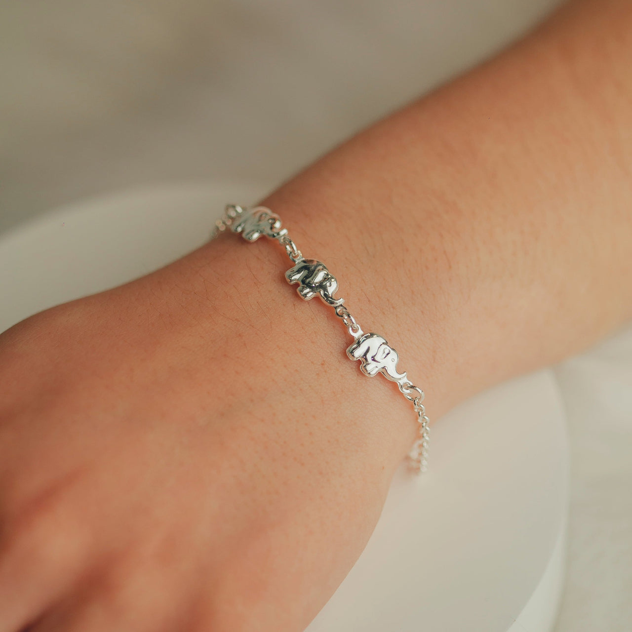 PULSEIRA DE PRATA COM ELEFANTES