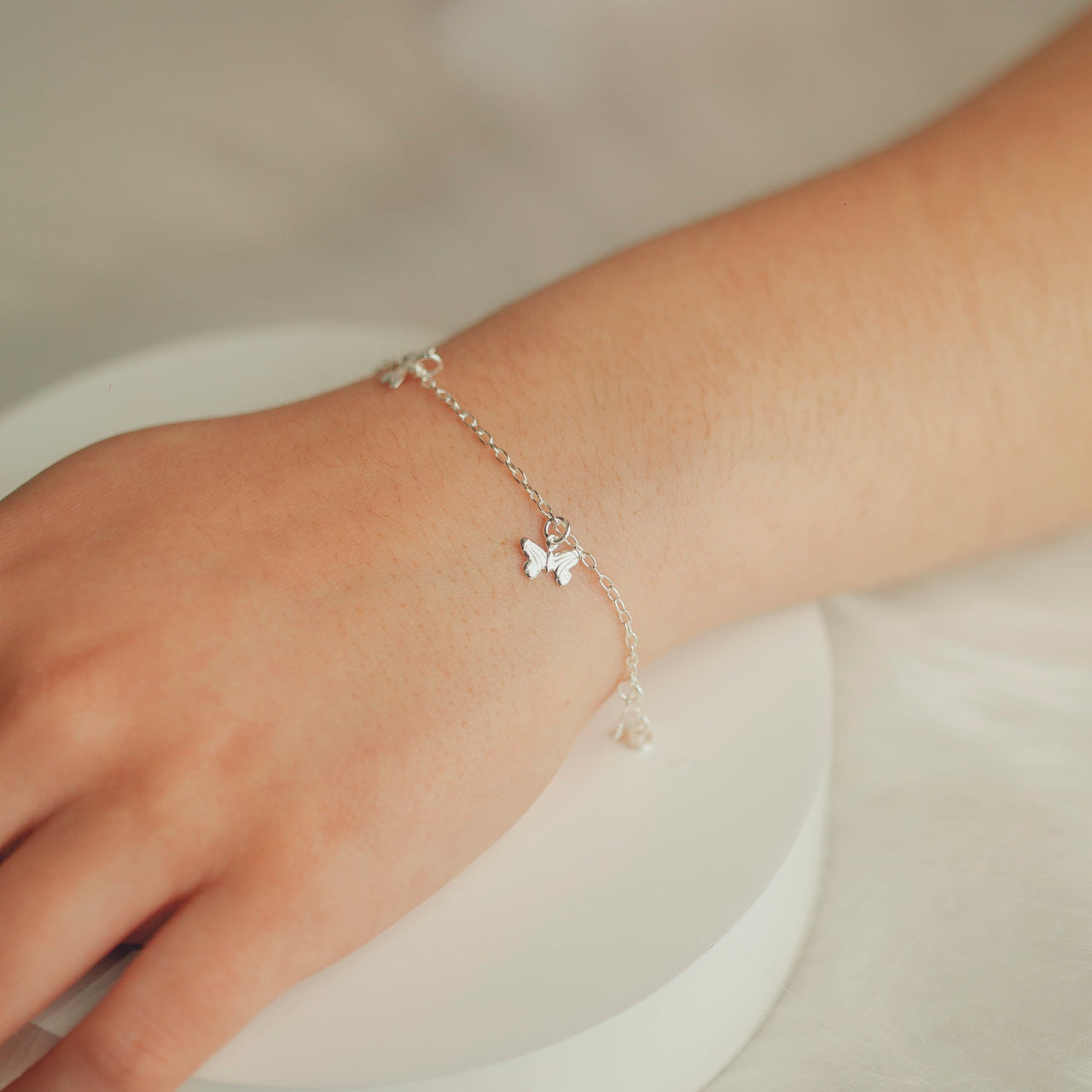 PULSEIRA DE PRATA INFANTILCOM BORBOLETAS