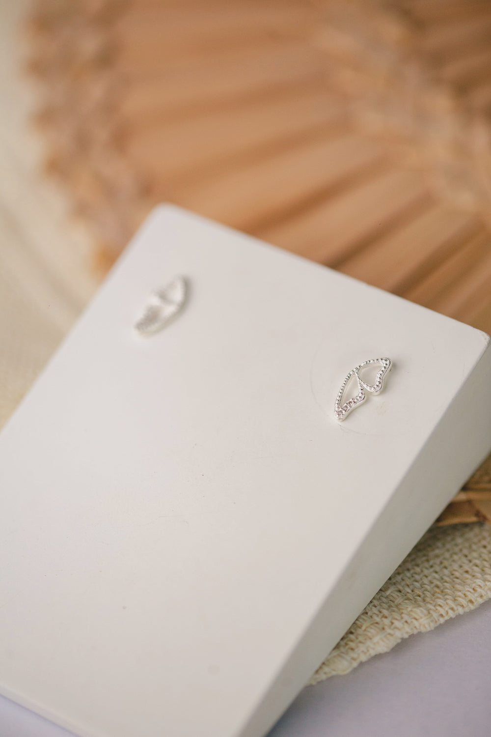 BRINCO DE PRATA MEIA BORBOLETA