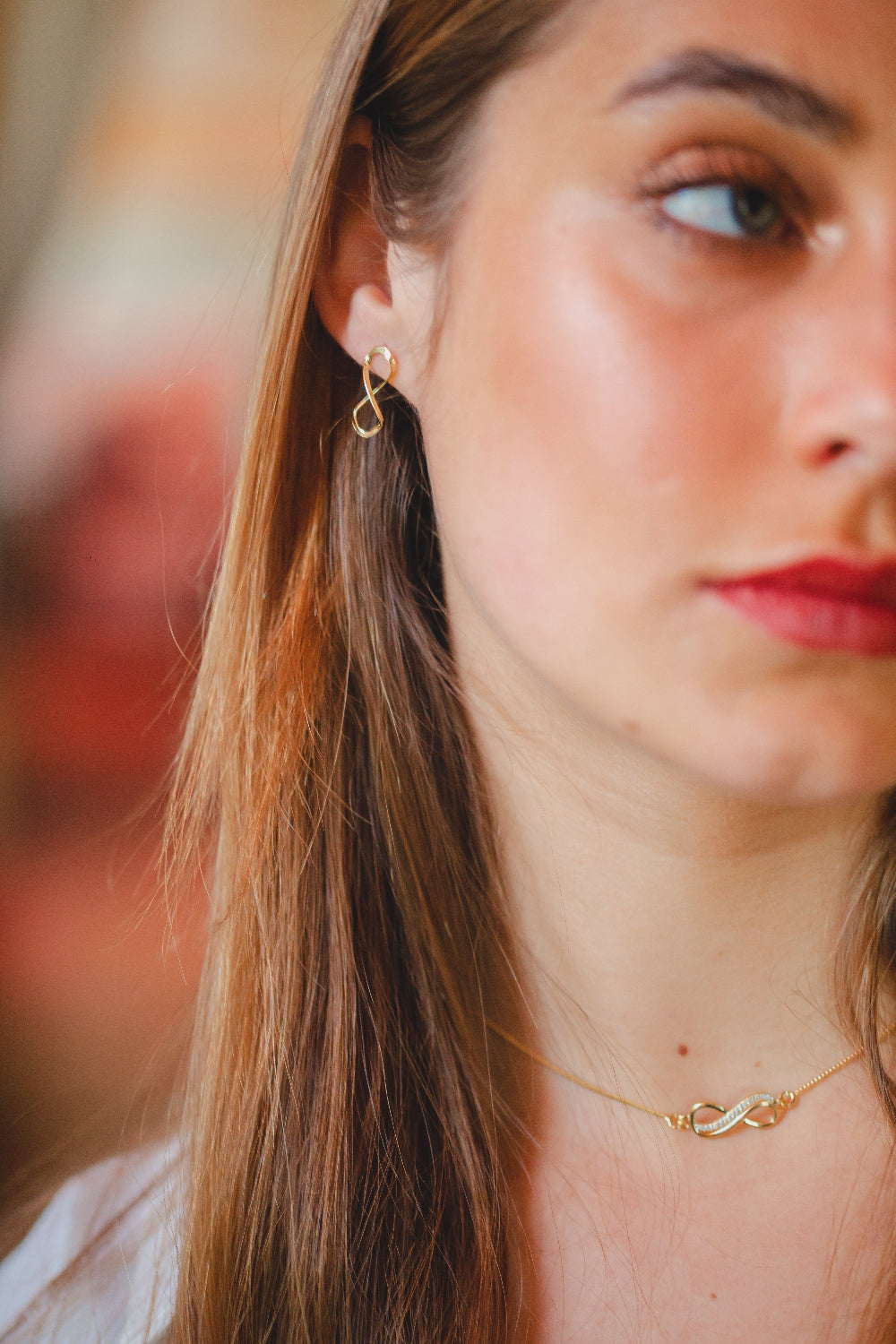 BRINCO INFINITO LISO PEQUENO FOLHEADO A OURO 18K