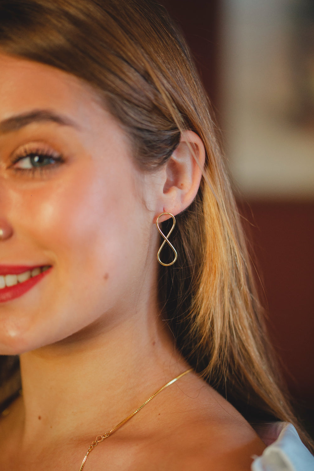 BRINCO INFINITO LISO FOLHEADO A OURO 18K