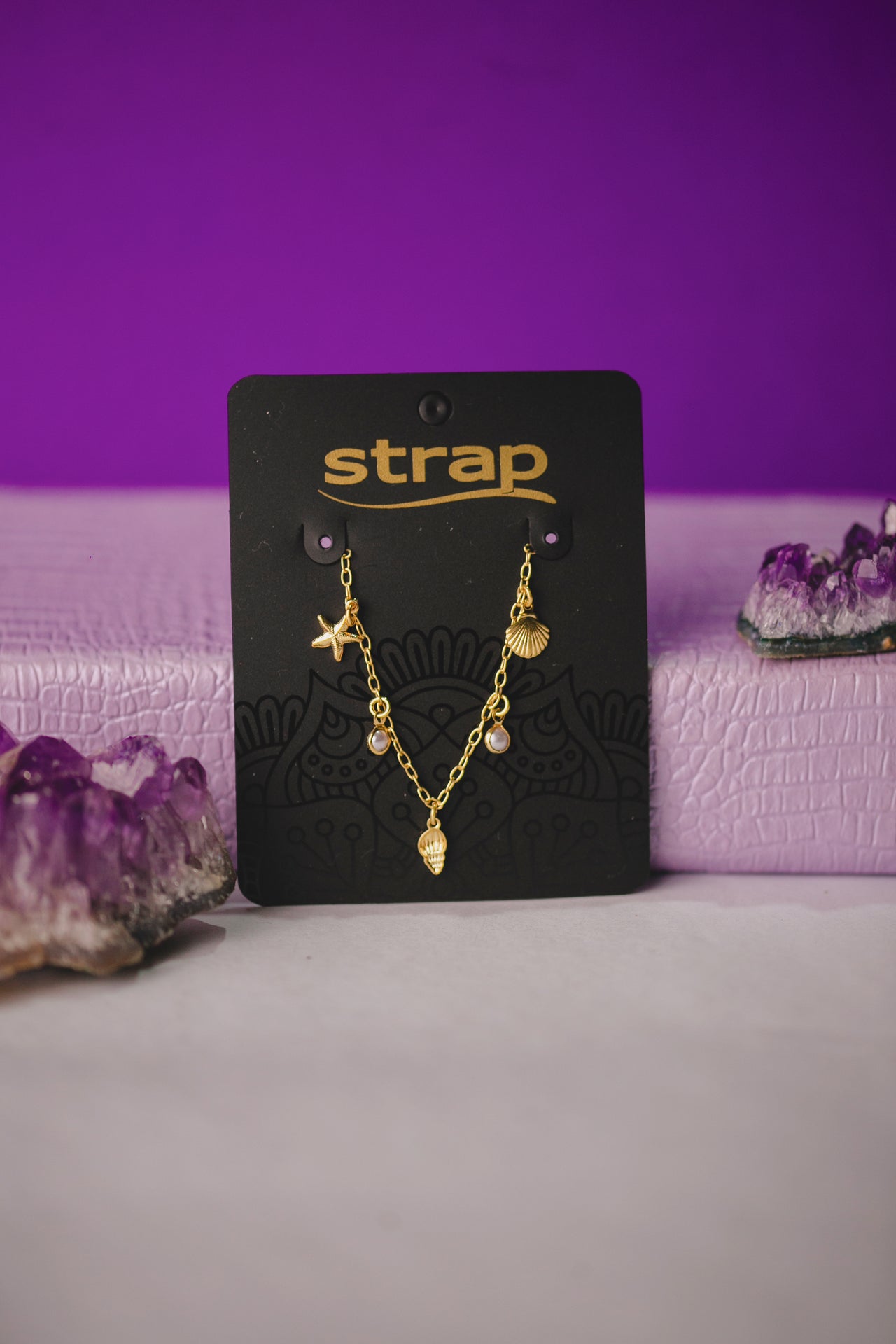 PULSEIRA PERÓLA, ESTRELA E CONCHAS FOLHEADO A OURO 18K