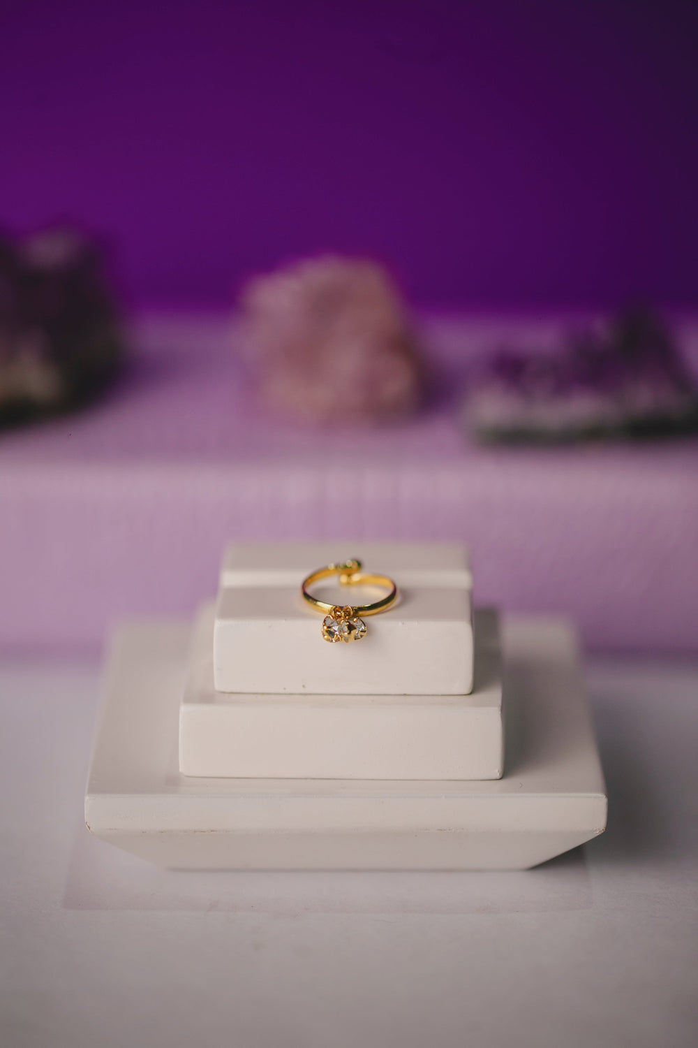 ANEL REGULÁVEL QUATRO ZIRCÔNIAS FOLHEADO A OURO 18K