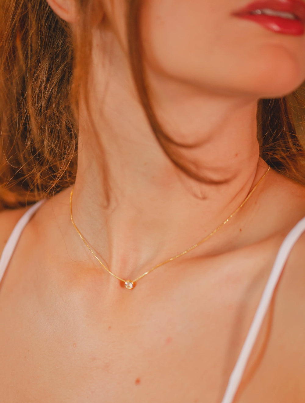 COLAR COM PONTO DE LUZ FOLHEADO A OURO 18K