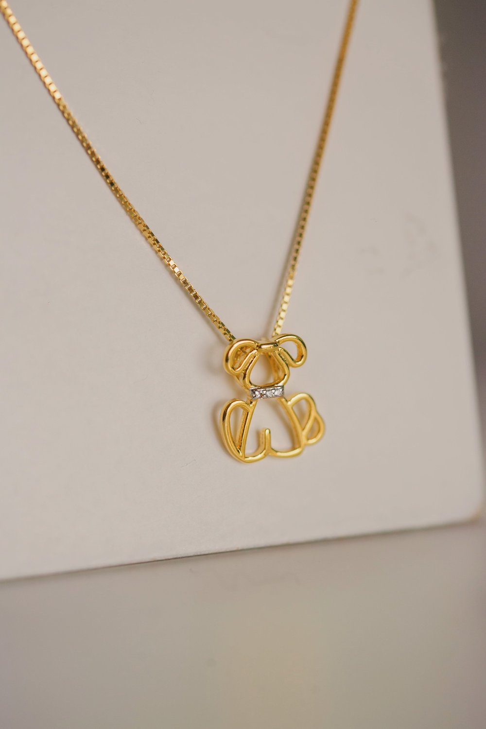 COLAR CACHORRO COM ZIRCONIA FOLHEADO A OURO 18K