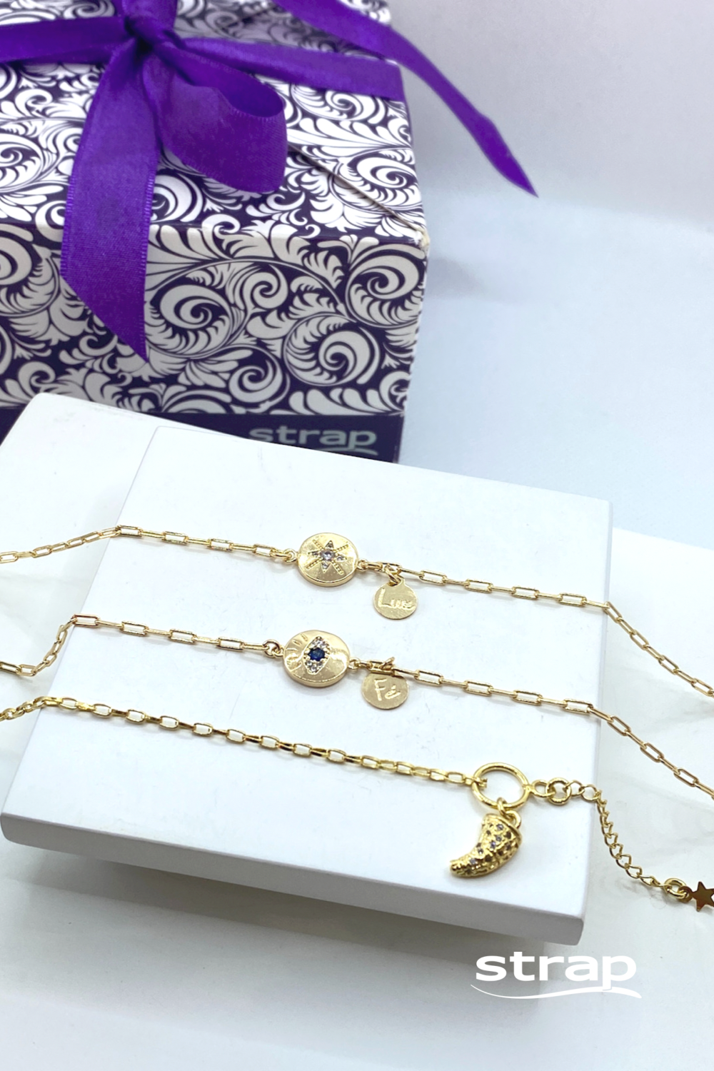 PULSEIRA LUZ COM PINGENTE CRAVEJADO DE ZIRCÔNIAS