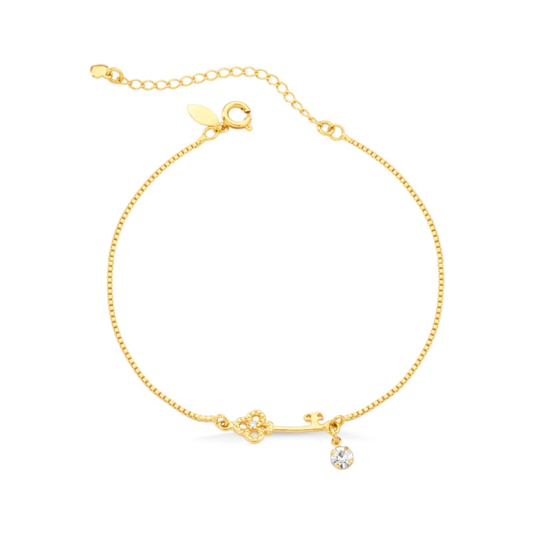 PULSEIRA COM CHAVE E ZIRCONIA FOLHEADO A OURO 18K