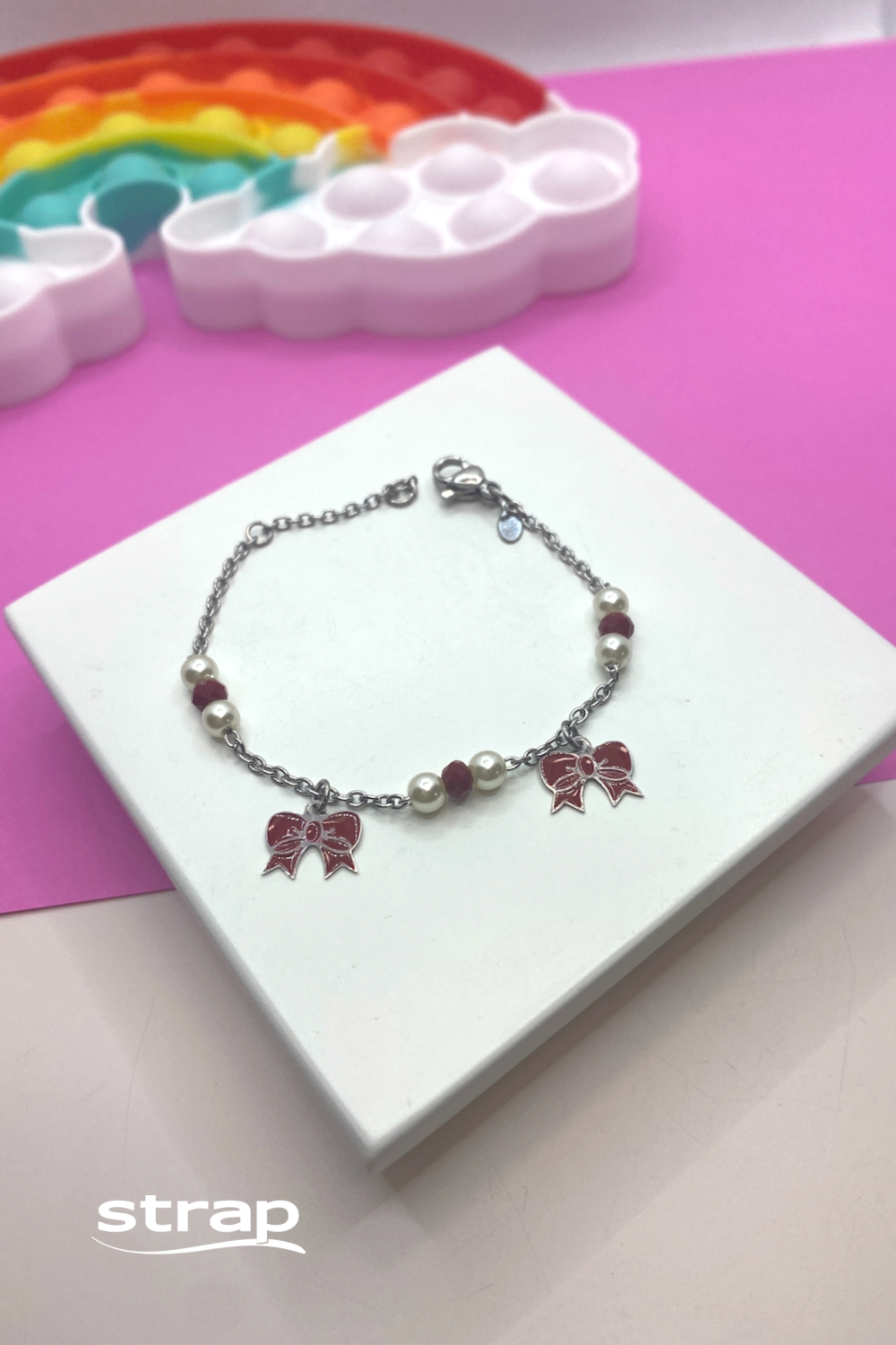 PULSEIRA COM LACINHO VERMELHO EM AÇO INOX