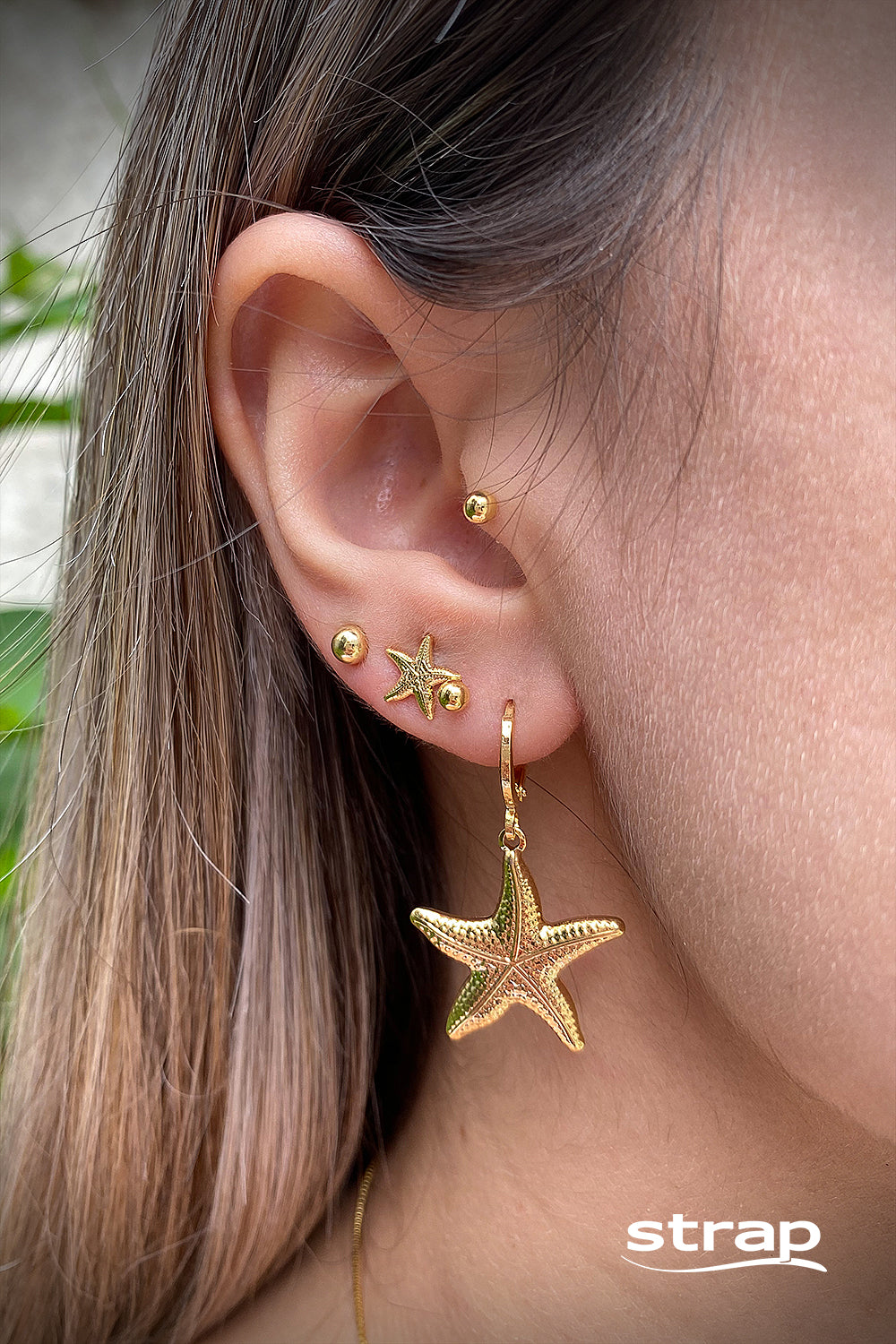 BRINCO MINI ESTRELA DO MAR FOLHEADO A OURO 18K