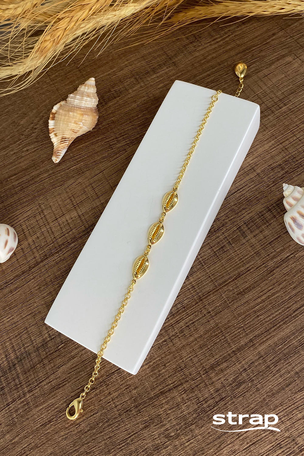 PULSEIRA TRÊS BÚZIOS FOLHEADA A OURO 18K