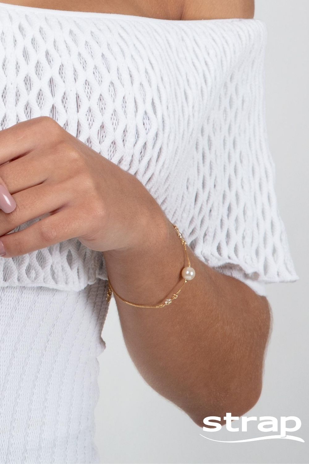 PULSEIRA COM PÉROLA E ZIRCÔNIAS FOLHEADO A OURO 18K