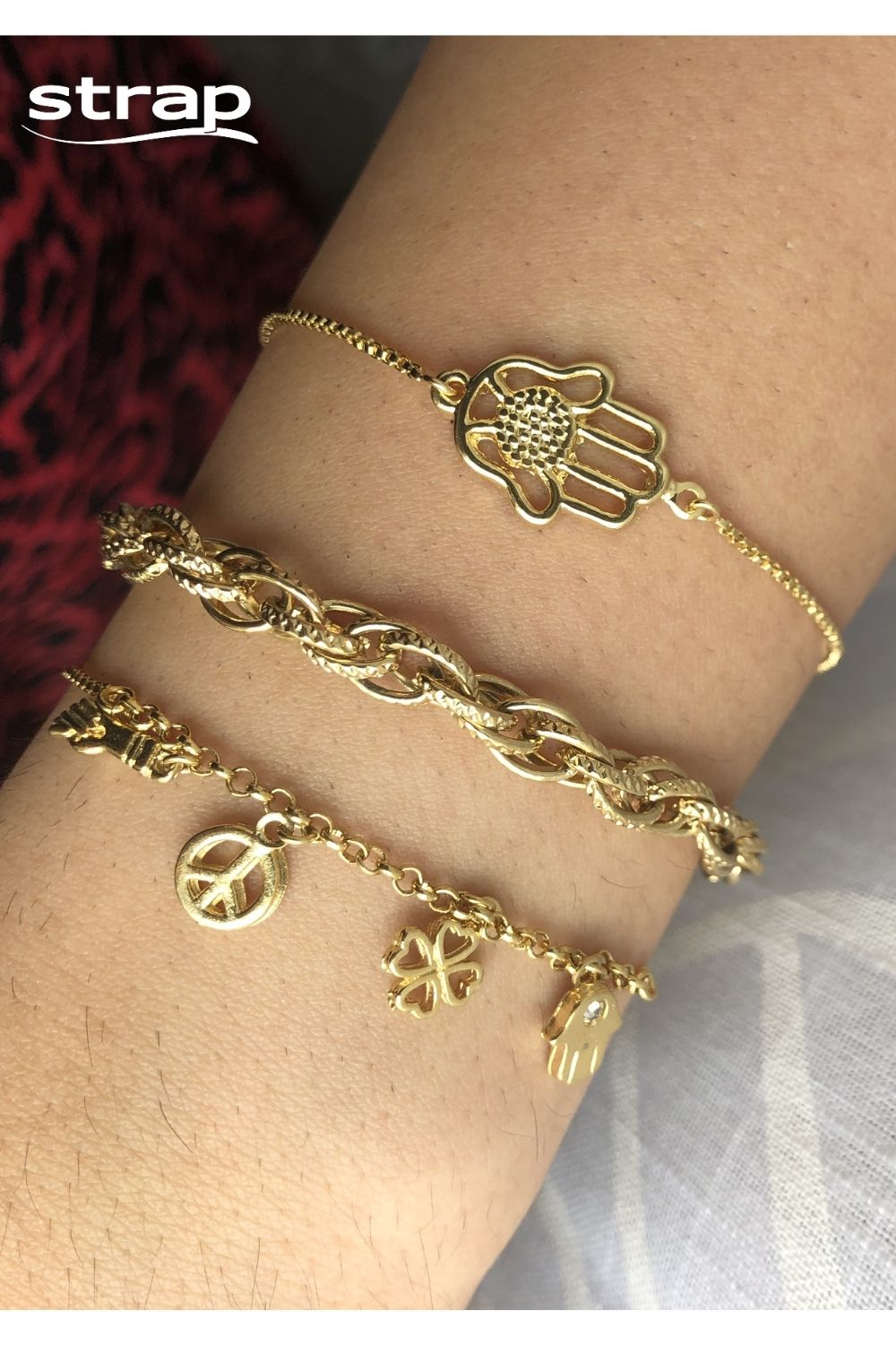PULSEIRA COM PINGETE DE HAMSÁ TREVO PAZ E FIGA FOLHEADA A OURO 18K