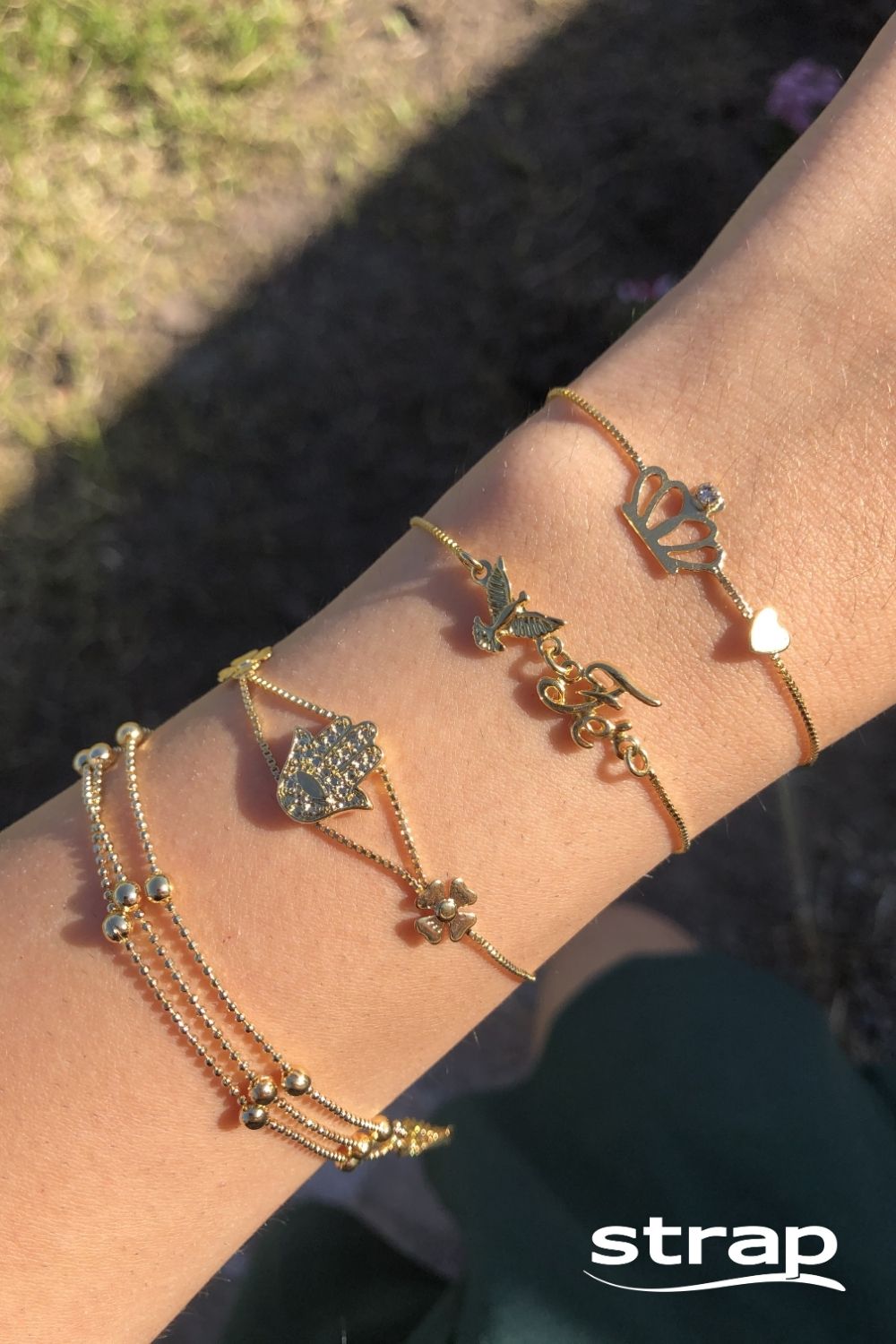 PULSEIRA REGULÁVEL COM ESPIRITO SANTO E FÉ FOLHEADA A O OURO 18K
