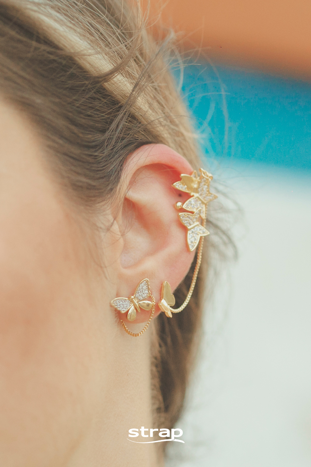 BRINCO DUPLA DE BORBOLETAS CRISTAIS FOLHEADO A OURO 18K