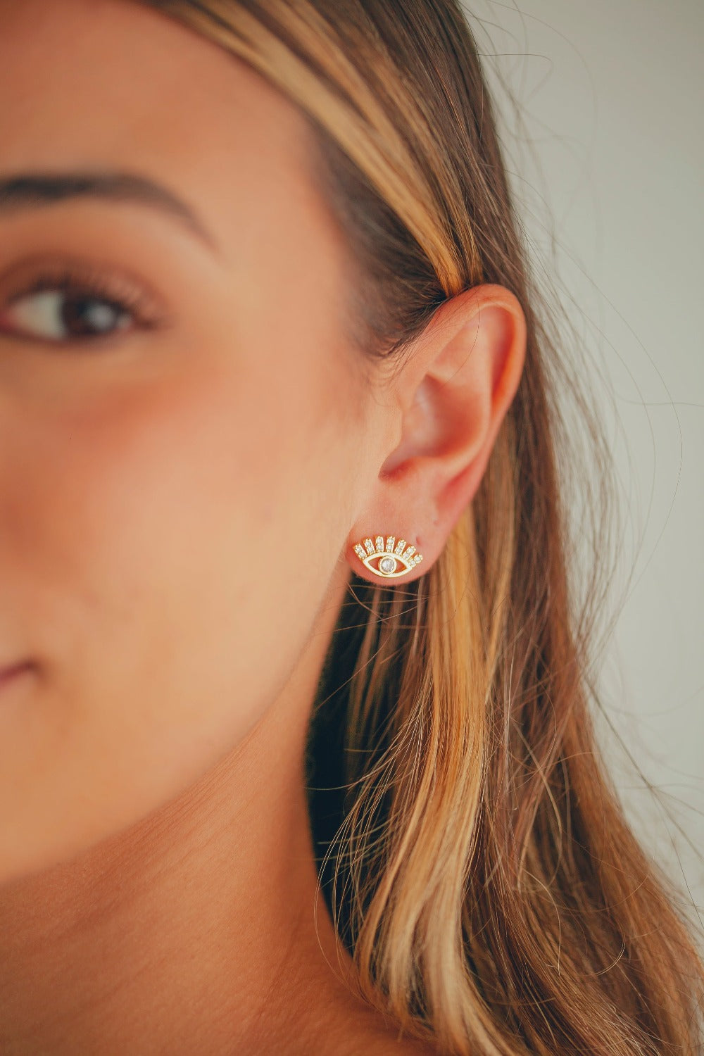 BRINCO OLHO GREGO COM ZIRCONIA FOLHEADO A OURO 18K