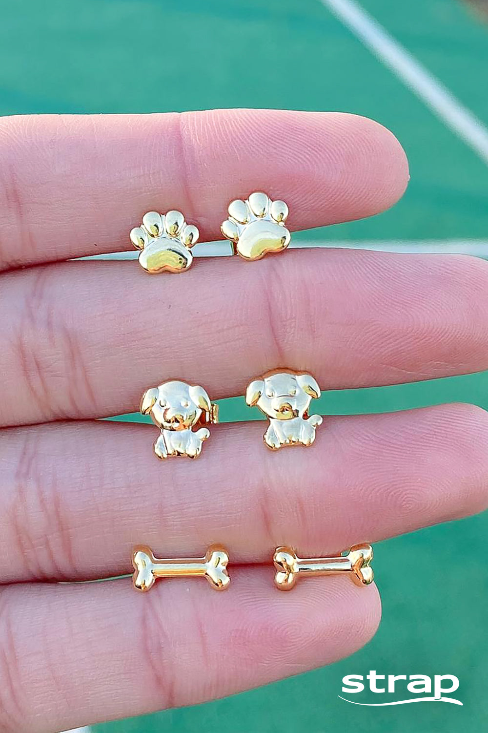 MINI BRINCO OSSINHO FOLHEADO A OURO 18K