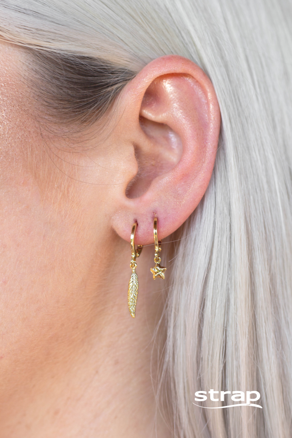 BRINCO ARGOLA COM PINGENTE DE PENA FOLHEADO A OURO 18K