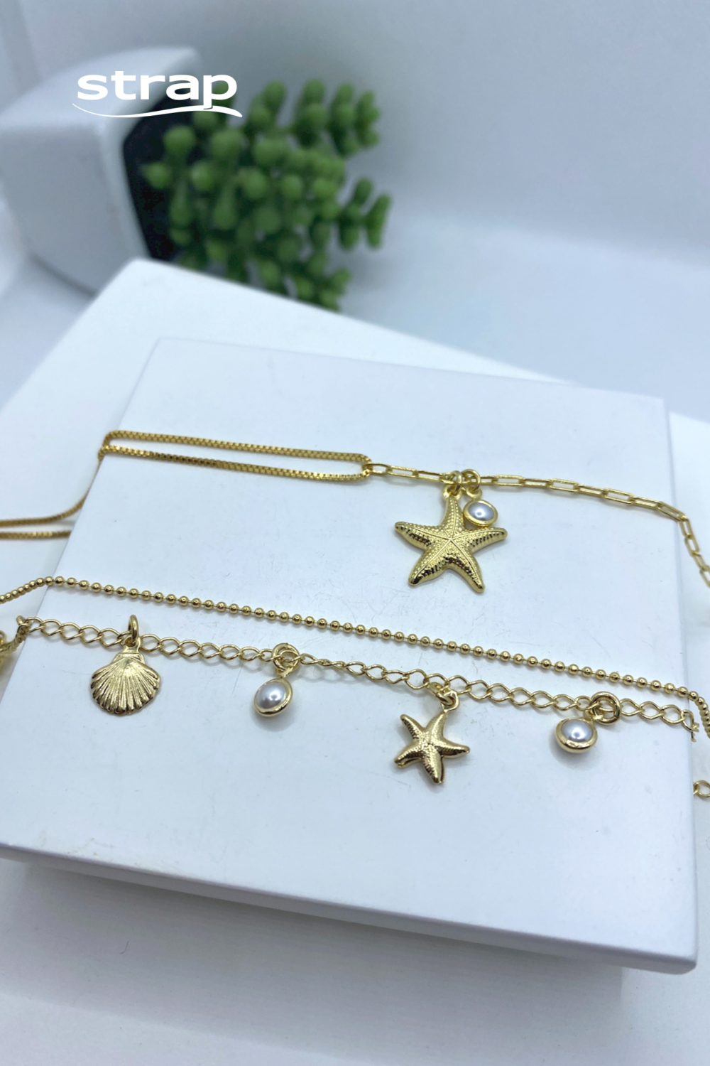 PULSEIRA DUPLA COM MOTIVOS DO MAR FOLHEADO A OURO 18K