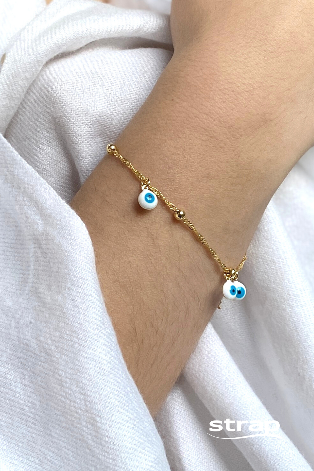 PULSEIRA COM BERLOQUES DE OLHO GREGO FOLHEADA A OURO 18K