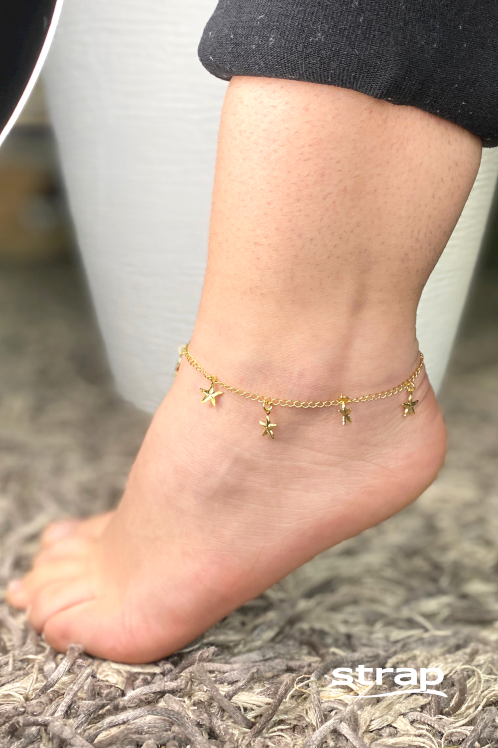 TORNOZELEIRA COM VÁRIAS ESTRELAS DO MAR FOLHEADO A OURO 18K