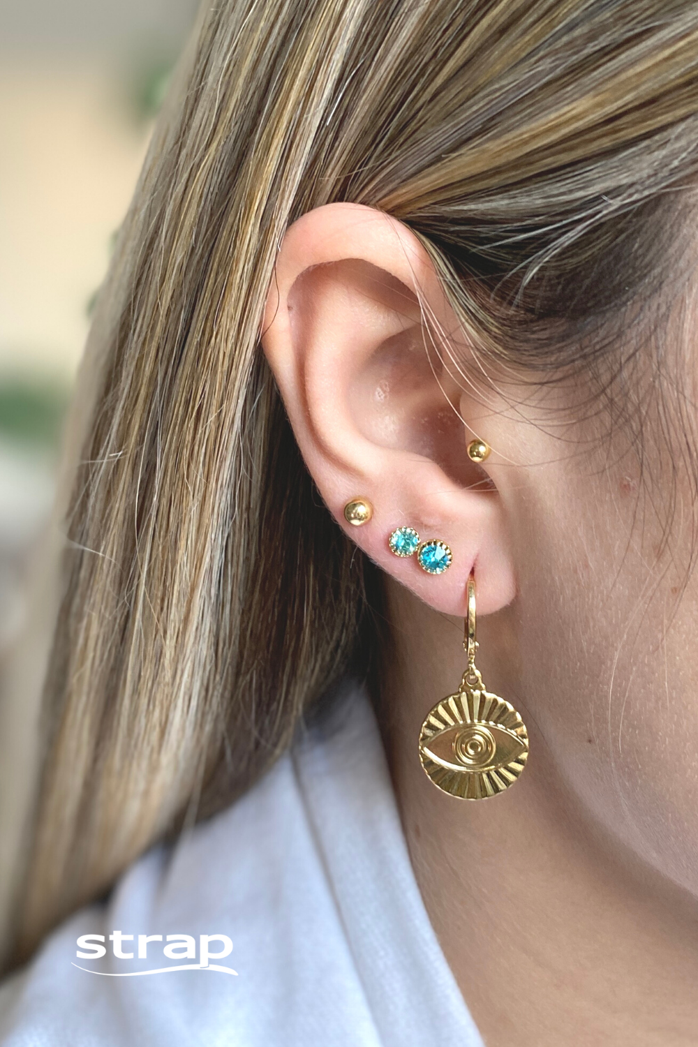 BRINCO DE ARGOLA COM OLHO GREGO FOLHEADO A OURO 18K