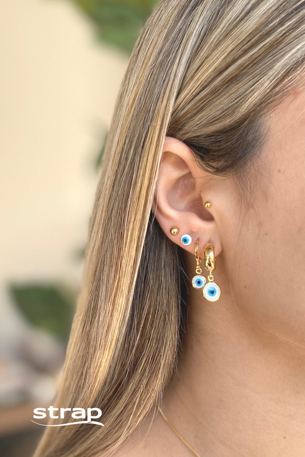 BRINCO ARGOLA COM TARRACHA E OLHO GREGO FOLHEADO A OURO 18K
