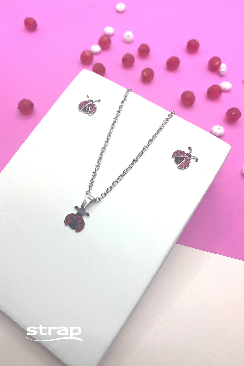 CONJUNTO DE BRINCO E COLAR COM PINGENTE DE JOANINHAS EM AÇO INOX