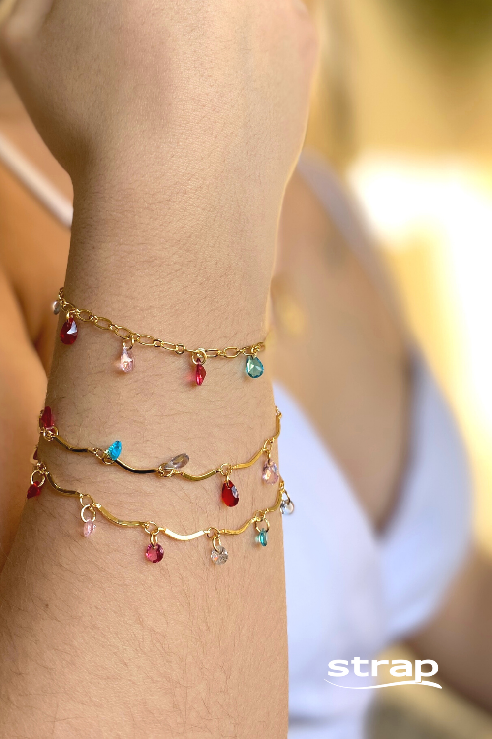 PULSEIRA SEMI RIGIDA COM PEDRAS COLORIDAS DE ZIRCONIA FOLHEADO A OURO 18K